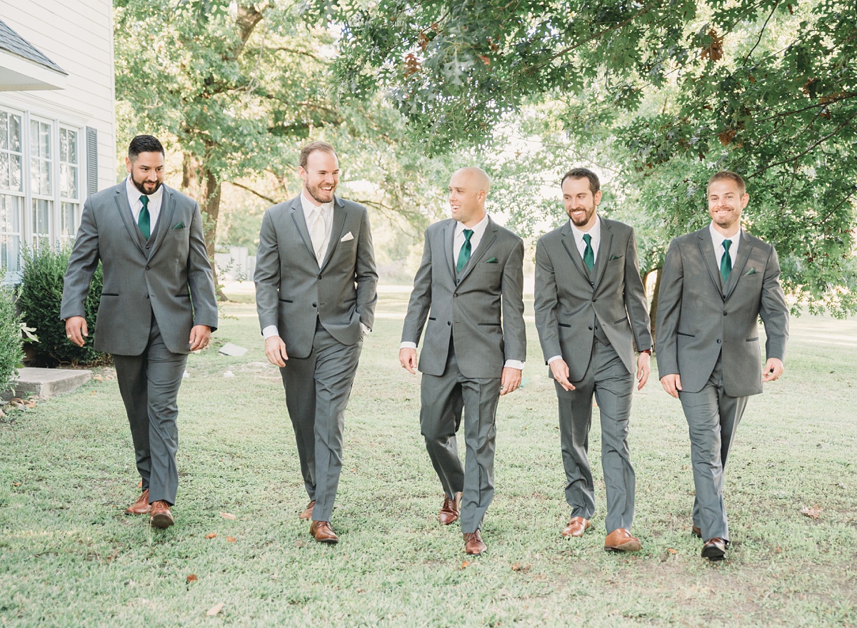 groomsmen walking together, River Road Chateau, wedding photography at anna tx wedding venue