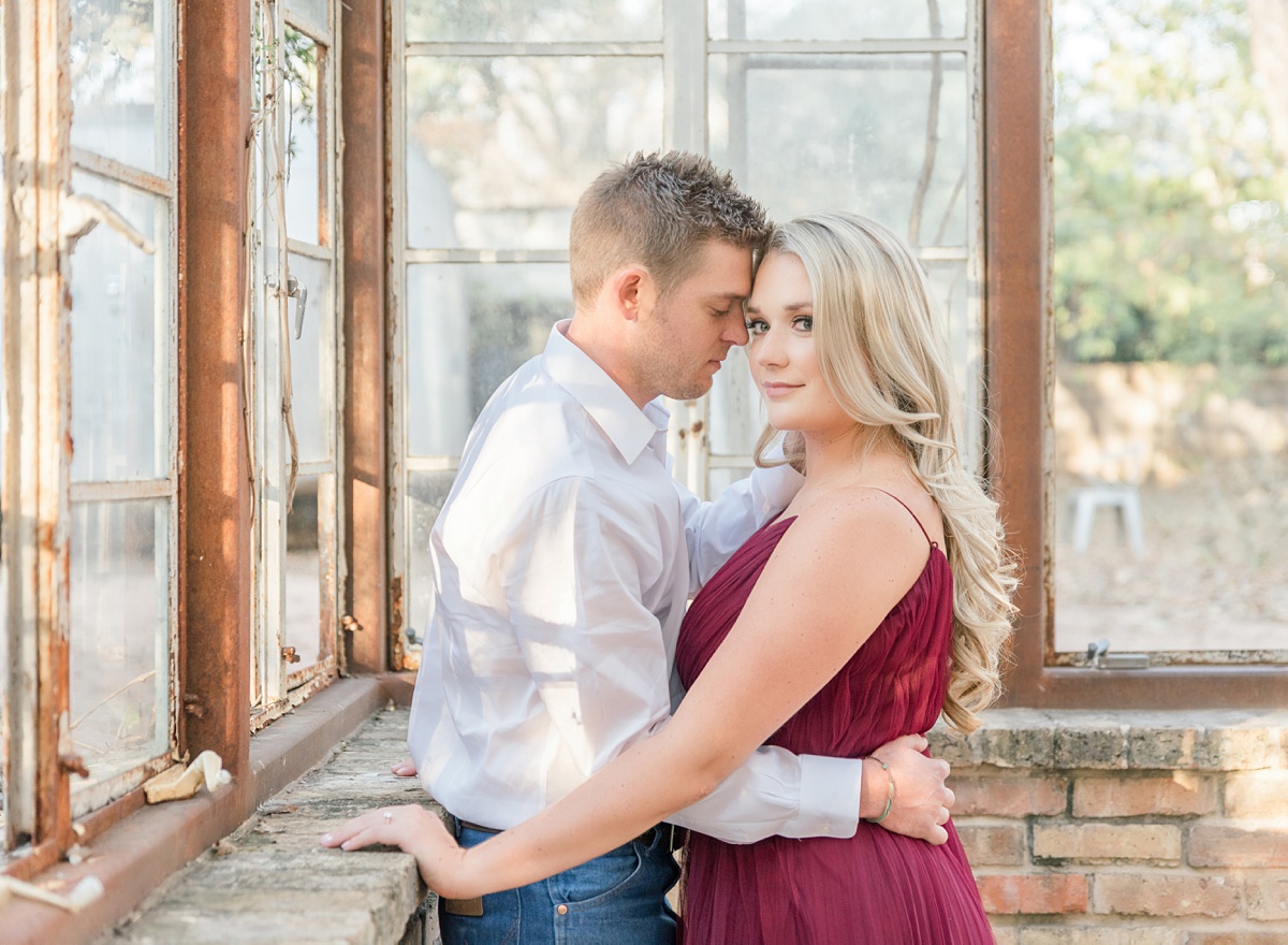greenhouse engagement session, bright and airy engagement session at sekrit theater in austin tx
