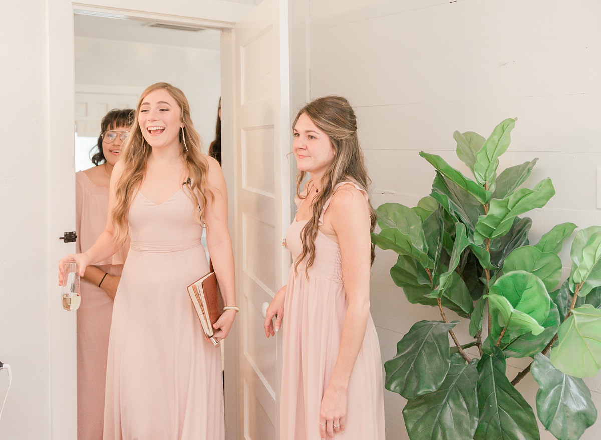 bridesmaids first look, the ivory oak hill country wedding venue, tara lyons photography
