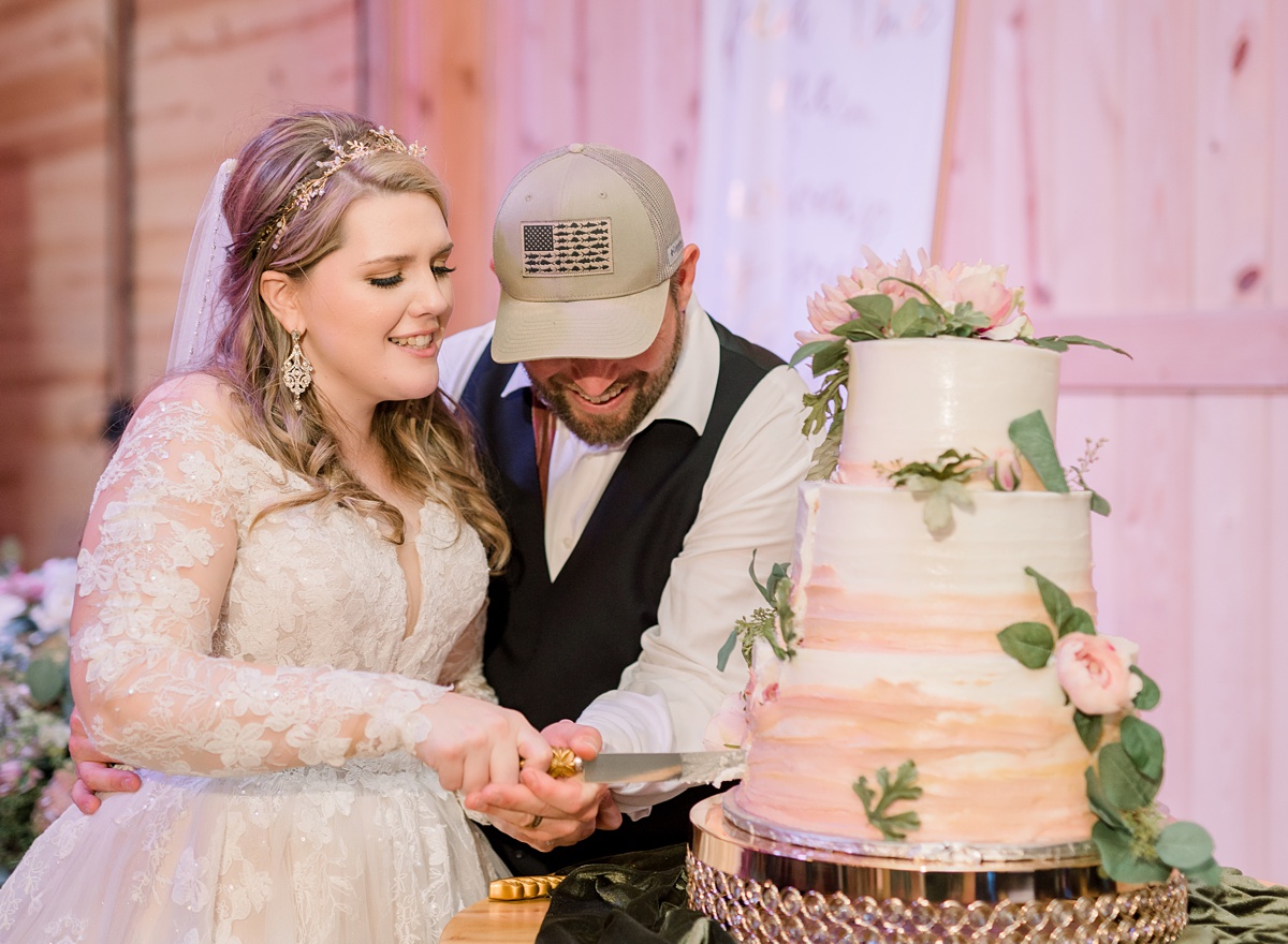 cake cutting at wedding reception - Blue Hills Ranch Fall wedding near Waco, TX