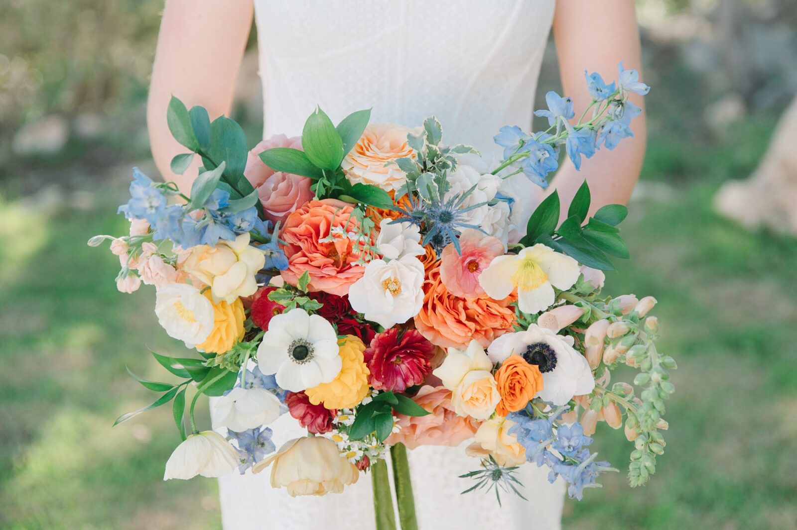 perry's petals, spring wedding bouquet, colorful bridal bouquet, rainbow wedding bouquet, wedding at the videre estate venue, wimberley, photos by Tara Lyons Photography, Perry's Petal, planning by sweet magnolia events