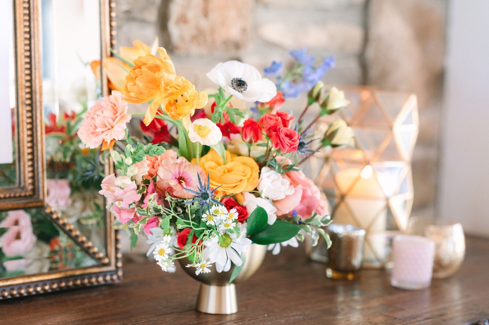 centerpiece on wedding welcome table, welcome table floral arrangement, wedding at the videre estate venue, wimberley, photos by Tara Lyons Photography, Perry's Petal, planning by sweet magnolia events