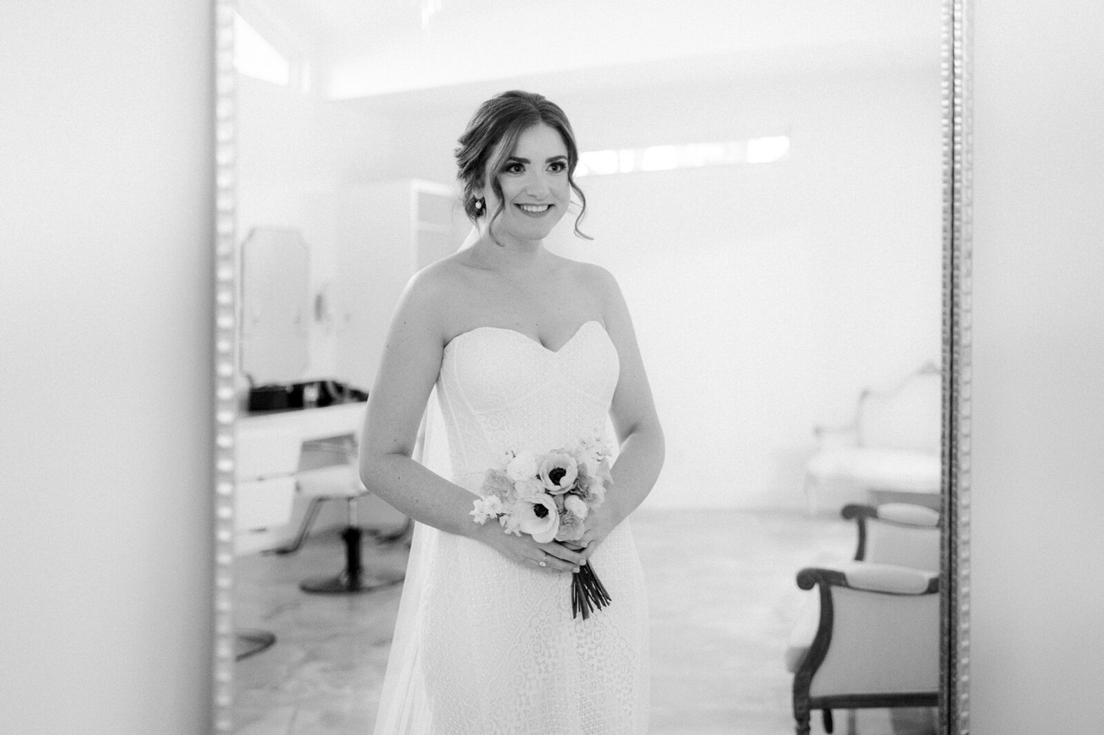 black and white bridal photos, bride looking in mirror, bridal suite at the videre, bridal session, bride photography, the videre estate, hill country wedding venue, wimberley wedding venue, austin wedding photography, tara paige weddings, 
